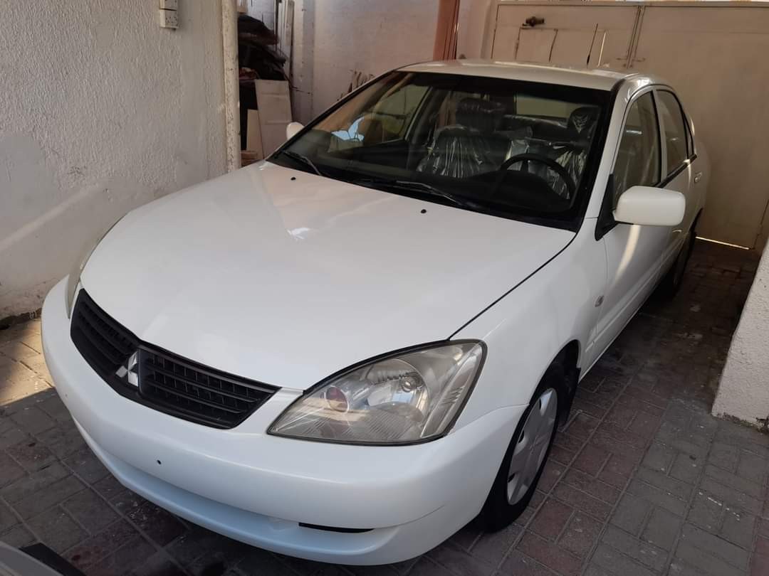 Remarkable Opportunity - 2010 Mitsubishi Lancer for 8k AED