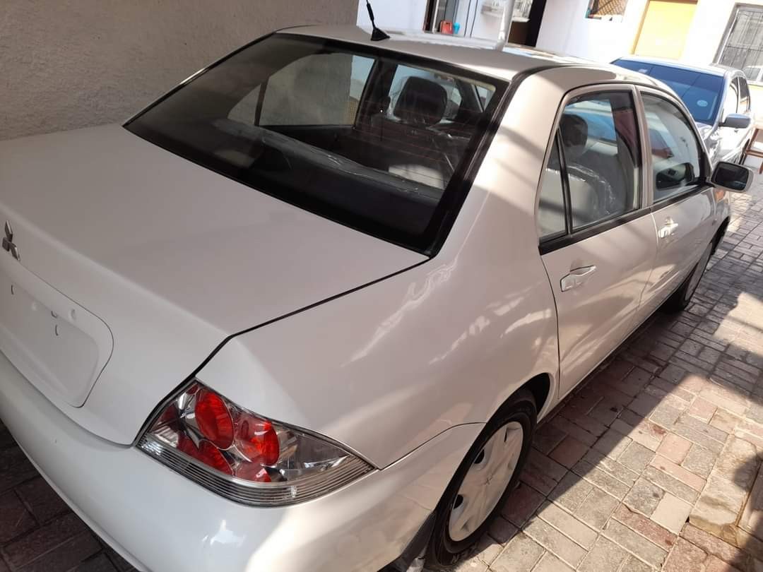 Remarkable Opportunity - 2010 Mitsubishi Lancer for 8k AED