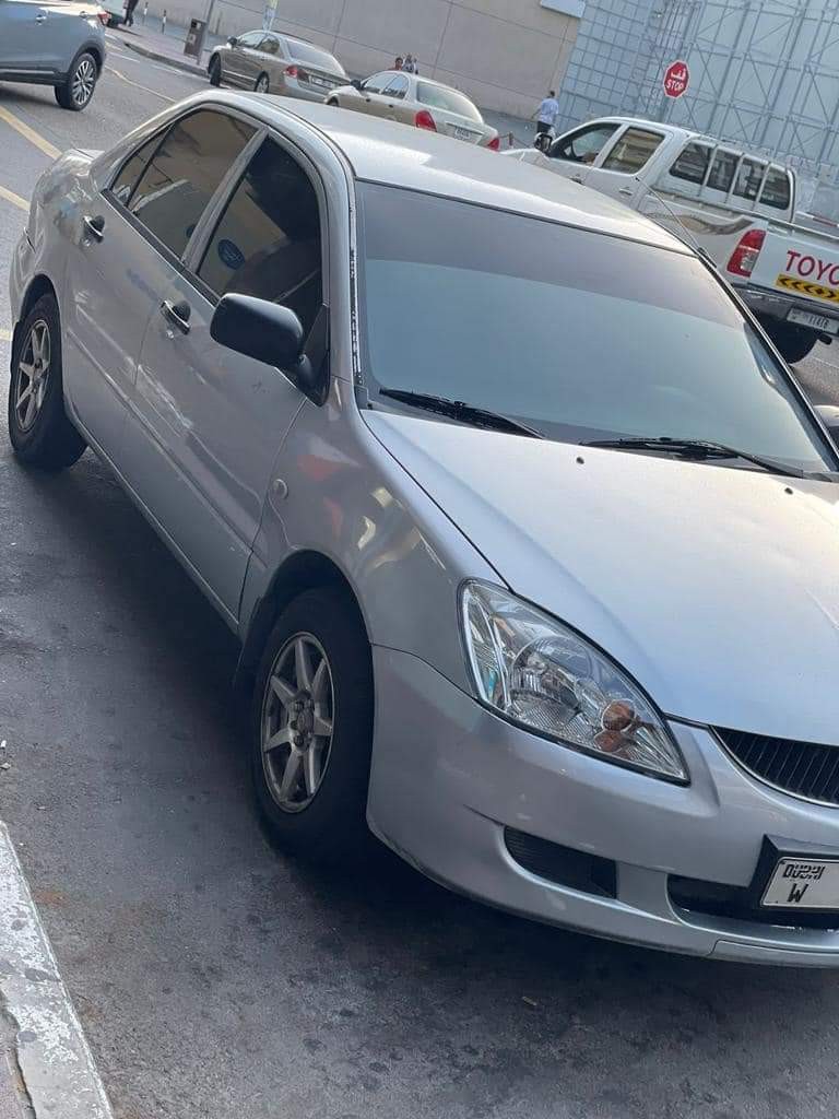 Snag Legendary Sedan - 2006 Mitsubishi Lancer for 6,000 Dirhams