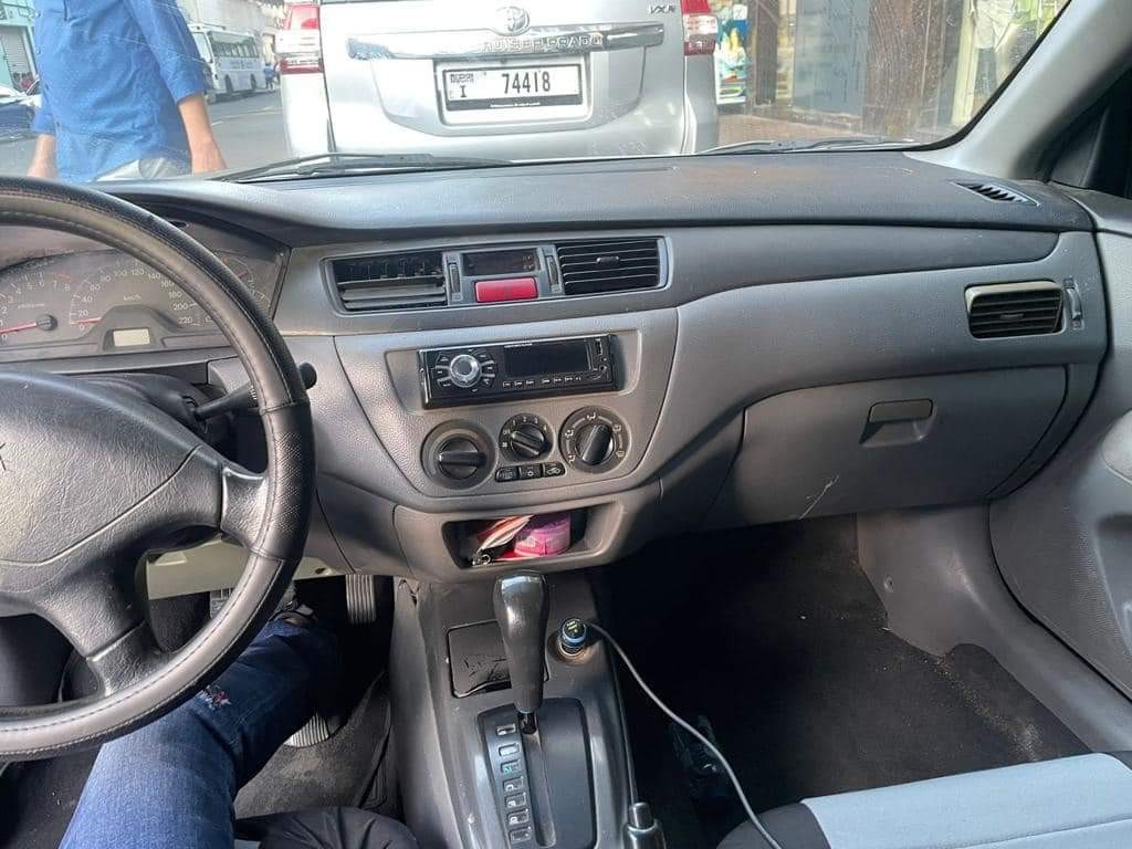 Snag Legendary Sedan - 2006 Mitsubishi Lancer for 6,000 Dirhams